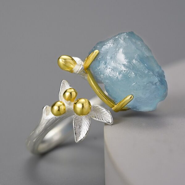 Gemstone Flower Ring , 18K Gold Natural Aquamarine .